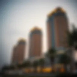 Stunning exterior view of Al Fattan Sky Towers at dusk